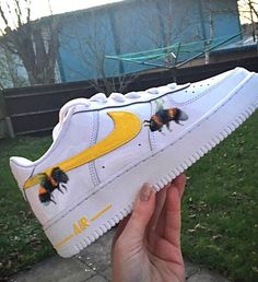 Hey my name is Ell and welcome to my page! Hand painted Bumble Bee inspired design with yellow Tick detail. Each pair of trainers is hand painted with care. Trainers are brand new and ready for customisation.  I offer a selection of other designs, head on to my page to see what else I have to offer. Have another idea, drop me a message and we can design your dream pair of shoes together.  Average 2-3 week delivery process but drop me a message for priority postage! Happy shopping! :) Yellow Customizable Casual Sneakers, Casual Yellow Customizable Sneakers, Yellow Custom Sneakers With Artwork Round Toe, Yellow Custom Artwork Sneakers With Round Toe, Yellow Custom Sneakers With Artwork, Hand Painted Yellow Sneakers For Streetwear, Yellow Low-top Sneakers With Custom Artwork, Custom Hand Painted Yellow Sneakers, Casual Yellow Custom Sneakers With Waterproof Paint