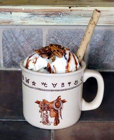 20 oz ceramic mug with boots, brands, saddle and brands imagery Boots Brands, Western Kitchen Decor, Travel Trailer Decor, Table Settings Everyday, Western Dishes, Western Furniture, Large Coffee, Western Home Decor, Eat In Kitchen