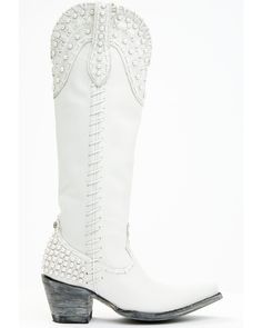 a pair of white cowboy boots with pearls on the side and heel, all in leather