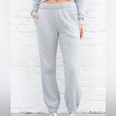 Soft Cotton Blend Sweatpants With Elastic Waistband, Side Pockets, And Elastic Cuffs. Great Material, Just Didn’t Fit Me Right. Brand New With Tags. Fabrics: 75% Cotton, 25% Polyester Measurement: 11" (28 Cm) Rise, 28" (71 Cm) Inseam, 24" (61 Cm) Waist (Stretch) Basic Loungewear Pants With Elastic Cuffs, Basic Spring Joggers With Elastic Waistband, Gray Loungewear Pants With Elastic Cuffs, Basic Bottoms With Ribbed Cuffs, Basic Bottoms With Elastic Waistband For Winter, Basic Bottoms With Elastic Waistband For Lounging, Basic Lounging Bottoms With Elastic Waistband, High-waisted Cotton Joggers For Loungewear, Spring Bottoms With Comfort Waistband