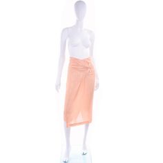 Comme des Garçons Vintage Asymmetrical Peach Rayon Skirt For Sale at 1stDibs Summer Peach Skirt, Fitted Peach Skirt For Summer, Summer Fitted Peach Skirt, Peach Lined Skirt, Chic Fitted Peach Skirt, Vintage Asymmetrical Summer Skirt, Vintage Asymmetrical Skirt For Summer, Fitted Apricot Bottoms For Summer, Comme Des Garcons Vintage