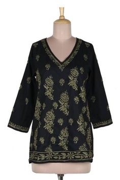 India's Shalabh designs this 100% cotton tunic featuring a V neck long sleeves and lateral slits for comfort and freedom of movement. Traditional chikankari hand embroidery in olive green is used to create intricate flowers buds and leaves across the field of jet black fabric to create this wardrobe staple which pairs with just about anything. V-neck Cotton Kurta With Resham Embroidery, Festival Cotton Kurta With Embroidered Sleeves, Festive Tunic Kurta With Embroidered Sleeves, Festive Embroidered Sleeve Tunic Kurta, Cotton Kurta With Embroidered Sleeves For Festivals, Traditional Embroidered Top With Chikankari V-neck, Traditional Embroidered V-neck Top With Chikankari, Traditional Chikankari Embroidered Top With V-neck, Cotton Straight Kurta With Embroidered Sleeves