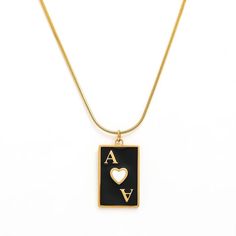 Ace of Hearts Card Necklace, a unique and stylish accessory that adds a touch of charm to your ensemble. Celebrate your love for games and make a bold fashion statement with the Ace of Hearts Card Necklace – a piece that effortlessly combines elegance, symbolism, and a dash of whimsy. Gold: 18k gold platingMaterial: Stainless steelLength: 41+5cm Waterproof jewelry Hypoallergenic Tarnish Free Glazd Pouch with every order Free US shipping Easy Exchange & Return policy PRODUCT INFOAll our jewelry a Ace Gold Necklace, Necklaces On Playing Cards, Playing Card Necklace, Black Heart-shaped Alloy Necklaces, Black Heart-shaped Alloy Necklace, Zodiac Cards, Ace Of Hearts, Gold Piece, Waterproof Jewelry