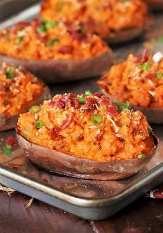 baked sweet potatoes with bacon and green onions