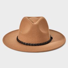 Keep your style cool and comfortable with this Recycled Polyester Wool Panama Hat from Goodfellow & Co™. This wool Panama hat features a reinforced stitch detailing, along with a woven band around the base of the crown for a touch of classic flair. A midweight knit construction provides a comfortable fit and the pull-on style makes it easy to put on or take off. Plus, the 3.25-inch brim keeps your face shaded from the sun's rays. Goodfellow & Co™: Feel good in what you wear, anywhere. Casual Flat Bill Felt Hat For Outdoor, Casual Winter Felt Hat For Rodeo, Brown Fedora For Winter Travel, Casual Beige Felt Hat For Rodeo, Brown Hat Bands For Travel In Fall, Brown Winter Fedora For Travel, Winter Travel Brown Fedora, Solid Color Winter Hat For Rodeo, Brown Travel Hat For Fall