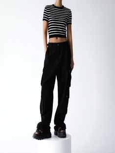 Chic and trendy oversized wide leg cargo pants in 100% cotton. Three pockets down outside leg with snap button closure detail. Model is in MINUSEY S. ✔️ Free worldwide express shipping over $100✔️ Loved by 6,500+ customers✔️ Limited edition collections, maximum styleStay ahead of the trend with can’t-find-anywhere-else staples. Your closet will thank you 💕 * MINUSEY S = EU 34, US 2* MINUSEY M = EU 36, US 4* 100% Cotton* Dry clean* Made in Korea - Model Height: 169cm/5'6" (US2, EU34) Black Baggy Wide-leg Cargo Jeans, Black Cotton Wide Leg Pants With Cargo Pockets, Black Cotton Cargo Style Wide Leg Pants, Black Cotton Wide Leg Cargo Pants, Black Wide-leg Cotton Cargo Jeans, Black Utility Wide Leg Pants With Cargo Pockets, Black Utility Wide Leg Pants With Multiple Pockets, Black Wide-leg Utility Cargo Pants, Black Baggy High-waisted Cargo Jeans