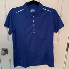 Beautiful Royal Blue Nikegolf Tour Performance Dri-Fit Woman’s Short Sleeve Golf Shirt. New Without Tags; Never Worn. Bank Corporate Logo Emblem On The Bottom Hem (Not Visible When Tucked In). Size L. From My Personal Collection In A Smoke Free And Pet Free Home. Classic Blue Sports Tops, Nike Collared Sports Tops, Sporty Blue Shirt, Sporty Nike Tops For Golf, Classic Blue Golf Tops, Casual Nike Golf Tops, Sporty Blue Golf Top, Classic Blue Golf Shirt, Sporty Blue Golf Shirt