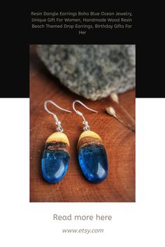 Each piece of my jewelry tells a different story. This pair of hand-carved wood resin earrings carry the calmness and stillness of a deep blue ocean! A great Gift for blue ocean Lovers who like to have a special piece of art that is not mass-produced and no one else has. ************************************ Details • Made To Order Earrings • Materials: High-Quality Walnut Wood And Resin. • Your Order Will Be Packaged In A Beautiful Box, Ideal For Gifts. • Each Of Handmade earrings Are Nature-inspired Blue Dangle Earrings, Bohemian Resin Jewelry With Matching Earrings, Artisan Blue Earrings, Blue Nature-inspired Drop Earrings, Unique Blue Jewelry For The Beach, Handmade Artisan Blue Earrings, Artisan Handmade Blue Earrings, Handmade Nature-inspired Resin Earrings, Nature-inspired Resin Earrings For Gifts