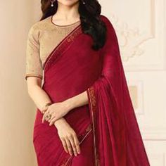 Maroon colored saree is made from art silk fabric which is highlighted with beautiful swarovski work as shown. comes along unstitched art silk (silk blend) blouse which you can customise as per your design/style. Occasion - You can wear this saree for festive and functions. Note:- The actual product may differ slightly in color and design from the one illustrated in the images when compared with computer or mobile screen. Elegant Semi-stitched Saree For Navratri, Bollywood Saree For Navratri, Unstitched Bollywood Blouse Piece In Chinon, Bollywood Style Dola Silk Saree, Bollywood Tissue Silk Blouse Piece, Chinon Saree Blouse For Eid, Elegant Salwar Kameez With Unstitched Blouse For Navratri, Bollywood Style Tissue Silk Blouse Piece For Navratri, Bollywood Art Silk Blouse Piece For Diwali