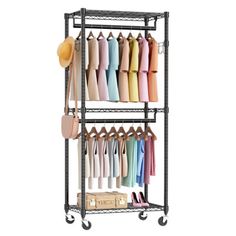 a metal rack with clothes and hats on it