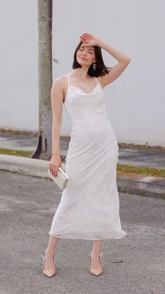 Indulge in the epitome of elegance with this delicate cowl neck midi dress adorned with a mesmerizing floral white design. Effortlessly chic, the cowl neckline drapes gracefully, while the midi length exudes sophistication. Features: Midi Cowl Neck Floral White Fabric Model is wearing a small 78956 E1-3 Spring Formal Maxi Dress With Cowl Neck, Elegant Midi Dress With Cowl Neck, Elegant Cowl Neck Midi Dress For Date Night, Elegant Cowl Neck Midi Dress For Summer, Elegant Spring Dress With Cowl Neck, Elegant Midi Dress With Cowl Neck For Formal Occasions, Cowl Neck Midi Dress, Cowl Neckline, Floral White