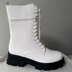 Dolls Kill N.Y.L.A. Academia Combat Boots Nwt Size 8 Color White/Black Brand New With Box These White Combat Boots Have A Treaded Slight Platform Sole And Chunky Heel, A Vegan Leather Upper With A High Rise, And A Lace Up In Front. Burning Man Boots, Bride Boots, Rave Boots, White Platforms, Goth Platforms, White Combat Boots, Dolls Kill Shoes, Leopard Boots, Lace Up Combat Boots