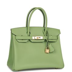 This Birkin is in Vert Criquet epsom leather with palladium hardware and has tonal stitching, front flap, two straps with center toggle closure, clochette with lock and two keys, and double rolled handles.The interior is lined with Vert Criquet chevre and has one zip pocket with an Hermes engraved zipper pull and an open pocket on the opposite side. Collection: ZOrigin: FranceCondition: Pristine; new or never (Plastic on hardware)Accompanied by: Hermes box, Hermes dustbag, clochette, lock, two keys, clochette dustbag, felt, carebook and rainhatMeasurements: 11.75" width x 9.5" height x 6" depth; 4.25" handle drop Birkin 30, Hermes Birkin 30, Hermes Box, Hermes Bags, Hermes Birkin, High Quality Leather, Gold Hardware, Customer Satisfaction, Luxury Bags