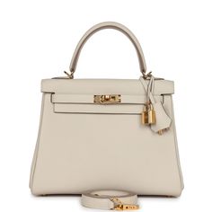 Hermes Kelly Retourne 25 Craie Togo Gold Hardware – Madison Avenue Couture Hermes Kelly Retourne, Limousine Car, Hermes Birkin 25, Hermes Birkin 30, Hermes Constance, Togo Leather, Hermes Box, Kelly Bag, Birkin 25