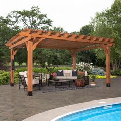 an outdoor living area next to a swimming pool