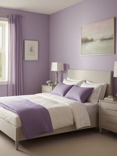 a bedroom with purple walls and white bedding