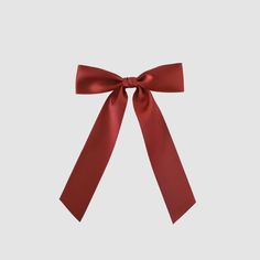 The Zoe petite satin ribbon hair bow is a slimmer version of the Zoe bow, perfect for fashion-forward girls of all ages. This bow adds a playful touch to any outfit. Look cute and stylish with the Zoe Petite Bow! Dimensions: Bow 5.5” W x Tails 7.25” L Simple Bow, Shorter Hair, Satin Ribbon Bow, Bow Shop, Tie Gifts, Ribbon Hair Bows, Small Women, French Barrette, Hair Shop