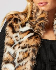 Go downtown with this cheetah-print faux fur vest. This revered animal print is a neutral in our book, so wear it with everything. Jumpsuit Jacket, Faux Fur Vests, Fur Vest, Cheetah Print, Faux Fur, Animal Print, Shopping Outfit, How To Wear