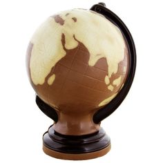 a brown and white globe sitting on top of a wooden stand with a black base