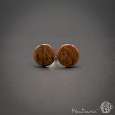 These natural wooden ear studs are handmade from Lacewood with stainless steel (hypoallergenic) posts. The ear studs are made to order and made just for you. They are unique, very light and comfortable to wear every day. The entire process to make your earring is about 1 week. -----Sizing----- Diameter: You can choose your diameter between 8 and 10 mm. The ear studs in the photo are 10 mm. Should you wish a different diameter please to contact me. Thickness: 2 to 3 mm -----Finish----- CA finish Minimalist Brown Earrings For Gift, Minimalist Brown Earrings As Gift, Wooden Round Earrings For Gifts, Round Wooden Earrings For Gifts, Round Wooden Earrings As Gift, Wooden Round Earrings Gift, Minimalist Stud Earrings, Boho Style Earrings, Minimalist Earrings Studs