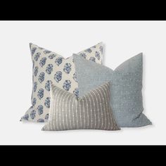 four pillows in various colors and patterns