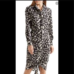 This Leopard Print Shirt Dress Is A Fabulous Day To Night Option. In A Cotton/Poplin Fabric, The Dress Is A Mid Style With Long Sleeves , Collared Neck, And A Tapered Waist. Dress Is Printed With Black And Cream Leopard Spots - A Nod To The Jungle Theme! Shirt Style Silhouette With Pockets. A Self Tie At Hemline Adds A Flirty And Sophisticated Touch. 100%Cotton. Worn Only Once. Chic Button-up Silk Shirt Dress, Leopard Print Shirt Dress, Print Shirt Dress, Leopard Print Shirt, Cotton Poplin Fabric, Leopard Spots, Jungle Theme, Printed Shirt Dress, Size 12 Dress