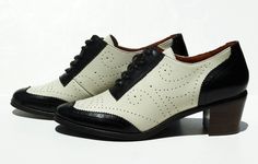 Boardwalk at REMIX Retro Wingtip Brogue Lace-up Shoes, Retro Wingtip Lace-up Shoes With Brogue Detailing, Round Toe Oxfords With Perforations For Derby, Vintage Wingtip Oxfords With Laces, Derby Oxfords With Perforations, Retro Leather Oxfords With Brogue Detailing, Retro Brogue Oxfords For Work, Retro Oxfords With Brogue Detailing For Work, Vintage Lace-up Shoes With Leather Sole And Low Heel