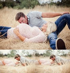 a man and woman laying on the ground in tall grass with their arms around each other