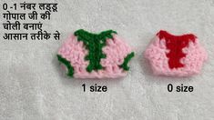 two crocheted hats are shown in different colors and sizes, one is pink, the other is green