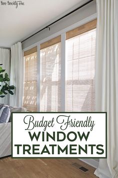 a living room filled with furniture and windows covered in white drapes that reads budget friendly window treatments