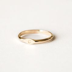 Personalizable and adorable, the Initial Signet Ring is the perfect way to have your loved one with you at all times. You can customize it with your loved one’s initial (or your own!), and wear it 24/7 because it’s gold filled - which makes it tarnish-resistant and waterproof! Its timeless design and perfect size make it the ideal everyday ring. Make it your own and cherish it forever! DETAILS 14k gold filled ring 2mm band Available in sizes 5-8 Safe for sensitive skin & shower safe Bundle & Sav T Ring, S Initial, Love Knot Ring, Solid Gold Bracelet, Everyday Ring, Diamond Jewelry Necklace, Solid Gold Necklace, Ringe Gold, Gold Signet Ring