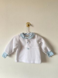 Vintage Carter's Baby sweater - soft fuzzy fabric, very warm! - cute collar and snap buttons - no stains or signs of wear White Collared Sweater With Buttons, White Collar Sweater For Winter, Soft Knit Long Sleeve Sweater For Playtime, White Long Sleeve Cozy Polo Sweater, White Cozy Long Sleeve Polo Sweater, Cute Long Sleeve Sweater With Button Closure, Cute Winter Tops With Button Closure, Cozy Long Sleeve Sweater For Playtime, White Buttoned Cozy Top