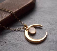 Crescent Moonstone Necklace In Gold, Gold Crescent Moonstone Necklace, Gold Moonstone Necklace With Moon Charm, Celestial Gold Necklace With Moonstone, Celestial Gold Moonstone Necklace, Gold Moonstone Necklace For Wedding, Gold Moonstone Teardrop Necklace, Gold Teardrop Moonstone Necklace, Oddities Jewelry