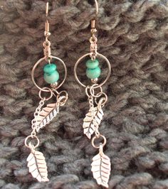 Turquoise Bead With Leaf Dangle Charms Within Small Hoop | Etsy Bohemian Hoop Earrings With Dangling Charms, Turquoise Dangle Hoop Earrings Nickel Free, Turquoise Dangle Hoop Earrings, Nickel-free Turquoise Dangle Hoop Earrings, Bohemian Turquoise Jewelry With Dangling Charms, Hypoallergenic Turquoise Beaded Dangle Earrings, Ear Clips, Diy Wire Jewelry, Leaf Charms