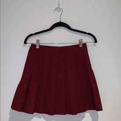 Never Worn Red Pleated Skirt For School In Spring, Red Skort For School In Spring, Red Mini Bottoms For School, Red Mini Length Bottoms For School, Red Mini Skirt For School In Summer, Casual Red Pleated Skirt For School, Red Mini Pleated Tennis Skirt, Red Mini Pleated Skirt For Spring, Red Pleated Mini Tennis Skirt