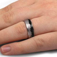 Say "I do" on your special day with this unique wavy mountain ring featuring real meteorite and fossilized dinosaur bone. The bold mountain design and ancient fossil inlay make this alternative wedding band a truly one-of-a-kind piece. You can even supply an image of your favorite mountain range to customize the shape of the meteorite mountains! RING LAYOUTRing Width: 8 mmRing Sleeve: TitaniumRing Profile: FlatRing Finish: Polished 0.5 mm Titanium3.5 mm Crushed Dinosaur Bone3.5 mm Gibeon Meteorite (Wavy Mountain Design)0.5 mm Titanium Mountains Ring, Making Rings, Gibeon Meteorite, Alternative Wedding Bands, Mountain Ring, Mountain Design, Dinosaur Bones, Mountain Designs, Ring Sizer