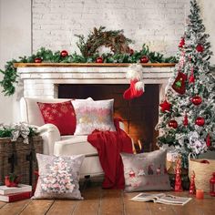 a living room decorated for christmas with red and white decorations