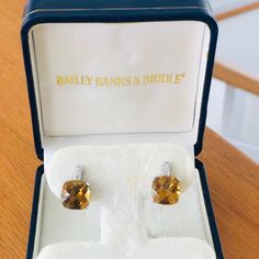 Beautiful Pair Of Smoked Topaz And Diamond Earrings Only Worn A Few Times Comes In Original Box From Bailey Banks And Biddle Set In Sterling Silver Comes From Smoke Free Home Formal Topaz Earrings, Formal Topaz Earrings With Gemstone Accents, Formal Topaz Earrings With Prong Setting, Topaz Anniversary Earrings With Gemstone Accents, Anniversary Topaz Gemstone Earrings, Luxury Topaz Earrings For Wedding, Anniversary Diamond Earrings With Gemstone Accents, Banks, Sterling Silver Earrings