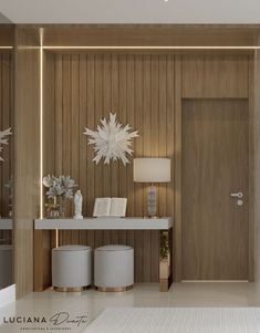 a room with wooden paneling and white decor on the wall, along with two stools