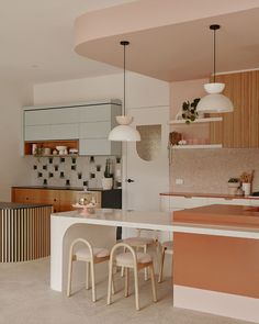 the kitchen is clean and ready to be used as a dining room or living area