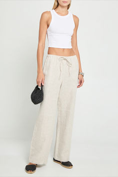 The Paloma Linen Pant is the ultimate blend of cool and comfort. Made with 100% linen, the drawstring waist and relaxed fit provide easy and effortless style for any occasion. Stay cool and comfortable in these versatile pants. Chic Linen Wide Leg Pants With Drawstring, Linen Drawstring Bottoms For Vacation, Linen Bottoms With Tie Waist, Spring Linen Pants With Drawstring, Spring Linen Drawstring Pants, Casual Linen Wide Leg Pants With Drawstring, Vacation Linen Bottoms With Drawstring, Linen Straight Pants With Tie Waist, Linen Wide Leg Bottoms With Drawstring