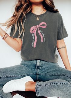 This is a high quality Comfort Colors tshirt with a trendy coquette aesthetic.🎀 This tee has a relaxed fit and a soft, lived-in feel you're going to love! Size up for an oversized trendy look and please refer to our size chart before ordering! We do direct-to-garment printing on our items. DTG is a process in which pigmented water-based inks are applied to the garment's surface and are absorbed by the product's fibers. The process itself resembles digital printing on paper. Disclaimer: colors a Coquette Tshirt, Coquette Clothes, Coquette Top, Soft Girl Era, Shirt Coquette, Comfort Colors Tshirt, Aesthetic Coquette, Comfort Colors Shirt, Soft Girl