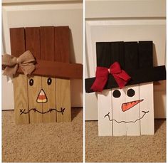 three wooden boxes with faces painted on them, one is wearing a hat and the other has a bow