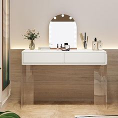 there is a vanity with a mirror and flowers on the counter in front of it