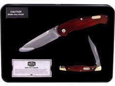 the knife is in its display case with instructions on how to use it for cutting