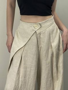 Casual Plain Regular Fit Linen Pants | stylewe Baggy Asymmetrical Pants For Spring, Chic Baggy Bottoms With Asymmetrical Hem, Asymmetrical Baggy Bottoms For Spring, Baggy Asymmetrical Bottoms For Spring, Spring Baggy Asymmetrical Bottoms, Beige Asymmetrical Hem Bottoms For Summer, Summer Workwear Bottoms With Asymmetrical Hem, Summer Pants With Pockets And Asymmetrical Hem, Versatile Asymmetrical Bottoms For Spring