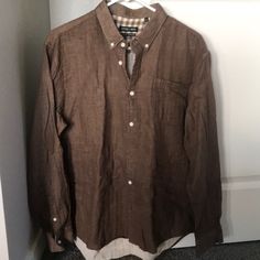 Super Soft Button Down. Could Be Dressed Up Or Down. Never Worn But No Tags. Brown Top With Button Closure And Casual Collar, Brown Button-up Tops With Placket, Brown Long Sleeve Shirt With Buttons, Brown Button-up Shirt With Buttoned Pockets, Brown Collared Shirt With Buttoned Pockets, Brown Spread Collar Top With Button Closure, Business Casual Top With Button Closure And Casual Collar, Brown Buttoned Shirt For Spring, Brown Shirt With Buttons For Spring