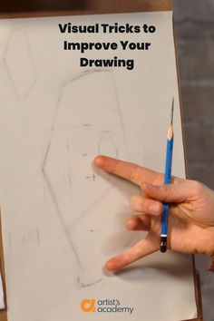 a person holding a pencil in front of a piece of paper with the words visual tricks to improve your drawing