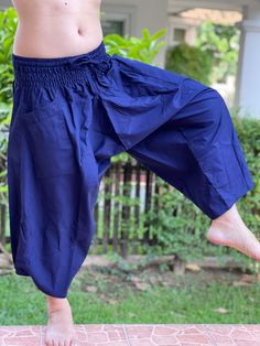 "Male Model Tall 5'9\" Waist 34\" Mens Japanese Samurai Style Japanese Casual, Harem Baggy Hakama cotton Pants Samurai Pants - elastic waistband Fits all! Unisex pants These beautiful casual pants is unique & comfortable to wear Handmade with a very lovely pattern, it is easy to wear and great for many occasions. One size fits most. These pants are great for many different activities like traveling, dancing, going to festivals, rock climbing, yoga, meditation, massage, working out, martial a Baggy Blue Harem Pants With Elastic Waistband, Blue Baggy Harem Pants With Elastic Waistband, Blue Casual Harem Pants For Yoga, Casual Blue Harem Pants For Yoga, Baggy Blue Yoga Bottoms, Blue Baggy Harem Pants With Tapered Leg, Blue Harem Pants With Elastic Waistband, Tapered Leg, Blue Baggy Yoga Pants, Baggy Blue Bottoms For Yoga