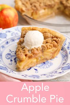 a slice of apple crumble pie on a blue and white plate